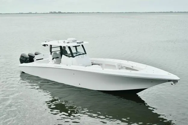 Slide: The Image of 2024 Fountain Bluewater 38 Tournament Edition boat on calm water. - 0