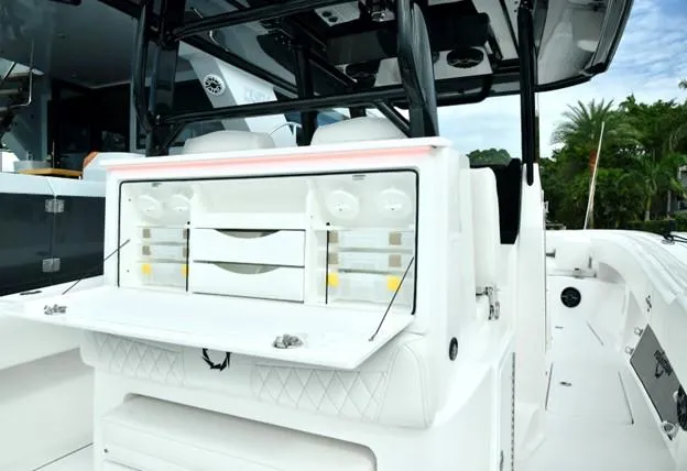Slide: The Image of 2024 Fountain Bluewater 38 Tournament Edition boat interior with storage compartments. - 3
