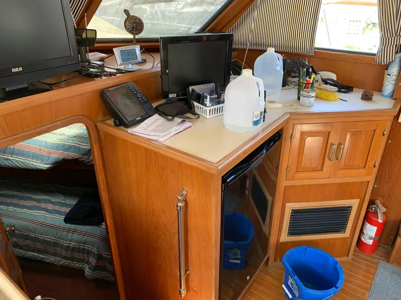 Slide: The Image of Interior of 1987 Kha Shing Vista 40 yacht with electronics and storage. - 10