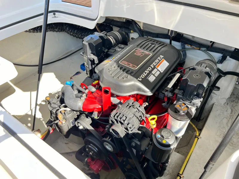 Slide: The Image of 2009 Cobalt 222 boat engine compartment with Volvo Penta engine. - 32