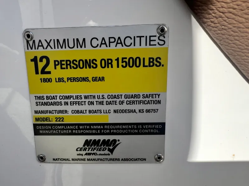 Slide: The Image of 2009 Cobalt 222 boat capacity plate, 12 persons or 1500 lbs, NMMA certified. - 39