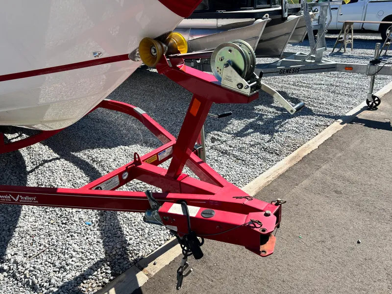 Slide: The Image of Red boat trailer for 2009 Cobalt 222 on gravel lot. - 4
