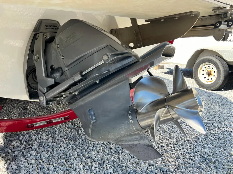 Slide: The Image of Close-up of a 2009 Cobalt 222 boat's Volvo Penta outdrive and propeller. - 9