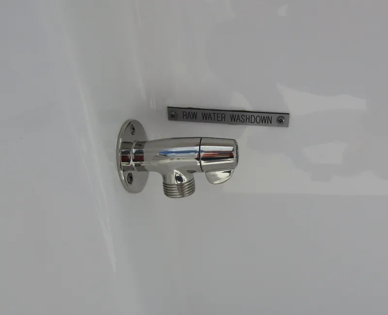 Slide: The Image of 2024 Wellcraft 202 Fisherman raw water washdown outlet. - 25