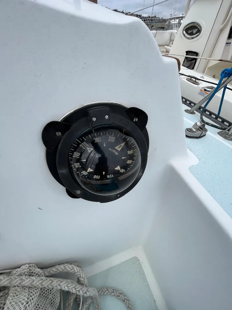 Slide: The Image of Close-up of a 1979 Ranger Yachts 30 compass in the cockpit. - 14