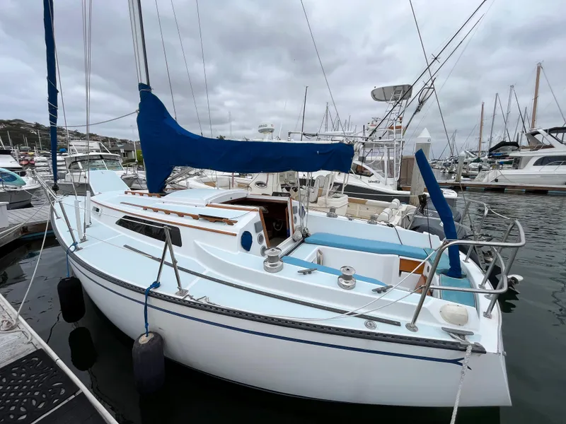 Slide: The Image of 1979 Ranger Yachts 30 sailboat docked in a marina. - 3