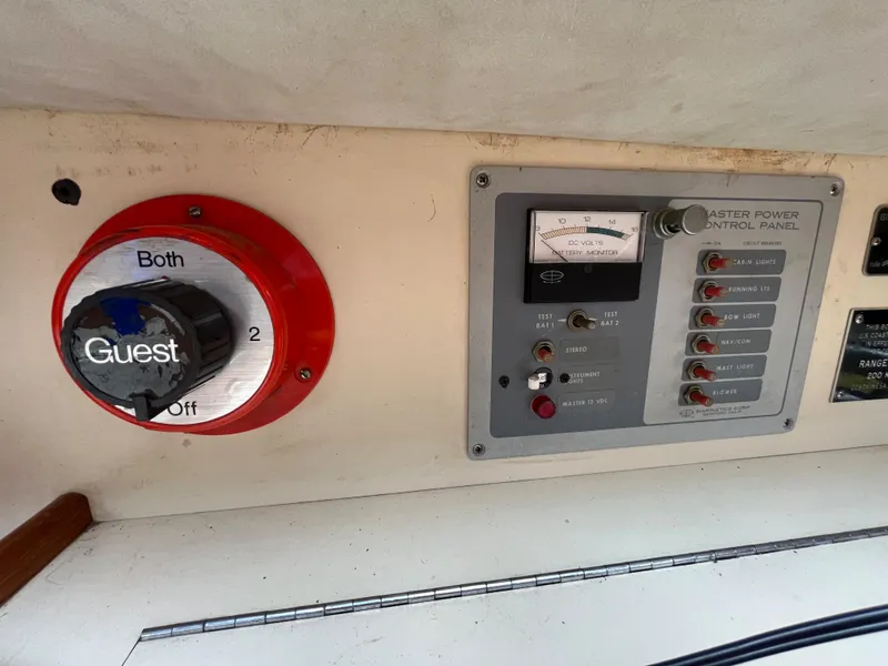 Slide: The Image of Control panel of a 1979 Ranger Yachts 30 with battery switch and power indicators. - 39
