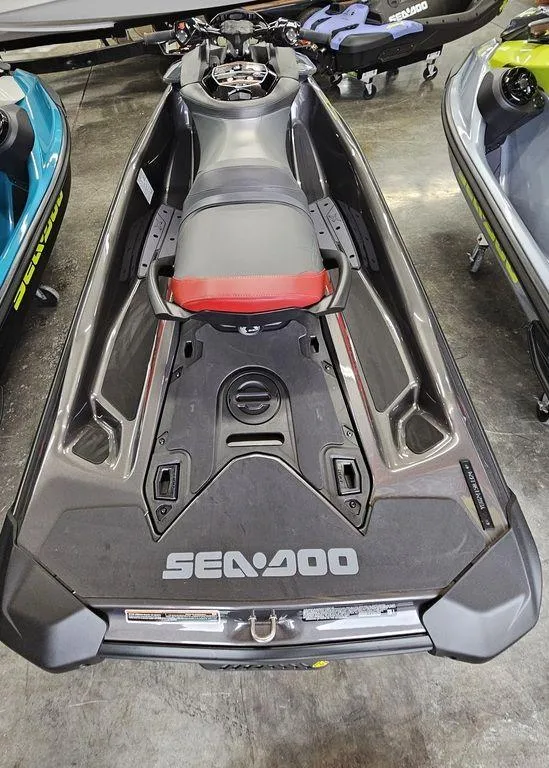 Slide: The Image of 2024 Sea-Doo GTR™-X 300 iBR jet ski, rear view in showroom. - 3