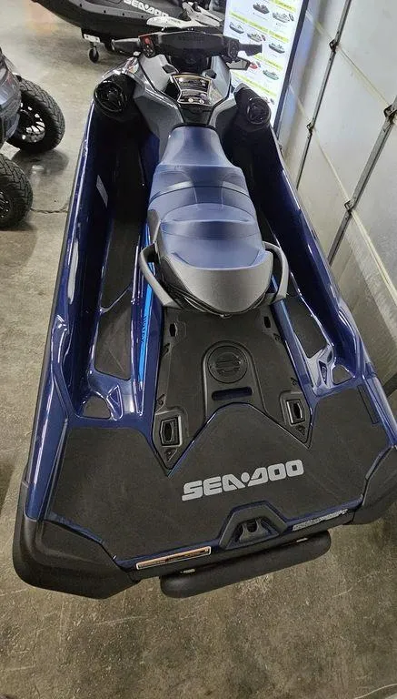 Slide: The Image of 2024 Sea-Doo GTX™ 300 Tech with Audio, iDF, and iBR in showroom. - 3