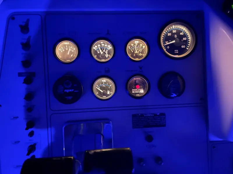 Slide: The Image of Illuminated control panel of a 1996 Carver 370 Aft Cabin boat. - 19