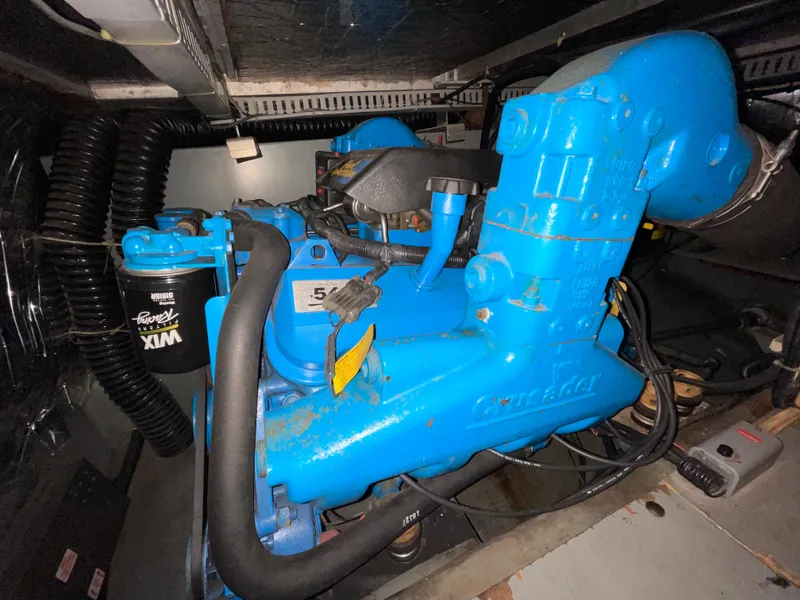 Slide: The Image of Blue engine inside 1996 Carver 370 Aft Cabin boat. - 2