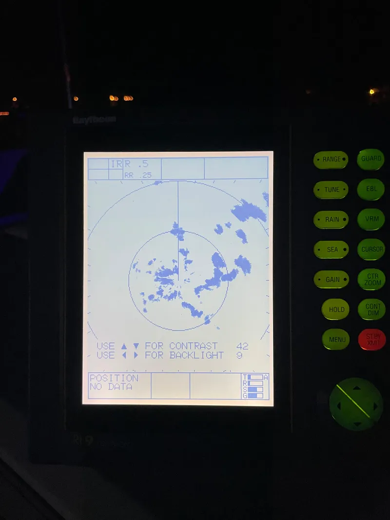 Slide: The Image of Radar display on 1996 Carver 370 Aft Cabin boat at night. - 21