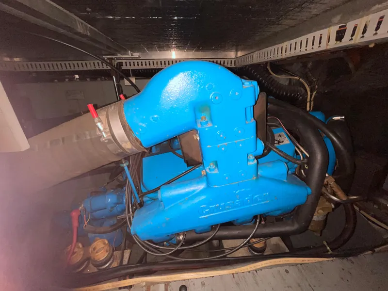 Slide: The Image of Blue engine inside 1996 Carver 370 Aft Cabin boat. - 4