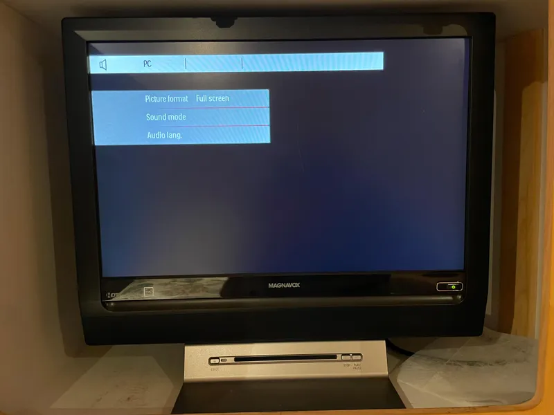 Slide: The Image of TV screen with settings menu in a 1996 Carver 370 Aft Cabin yacht. - 40