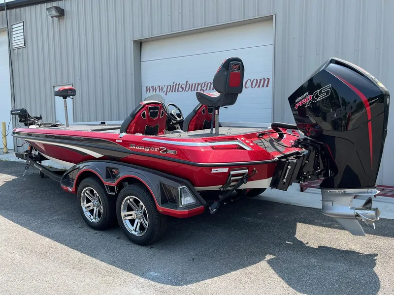 Slide: The Image of 2024 Ranger Z520R bass boat with dual console and powerful outboard motor. - 15