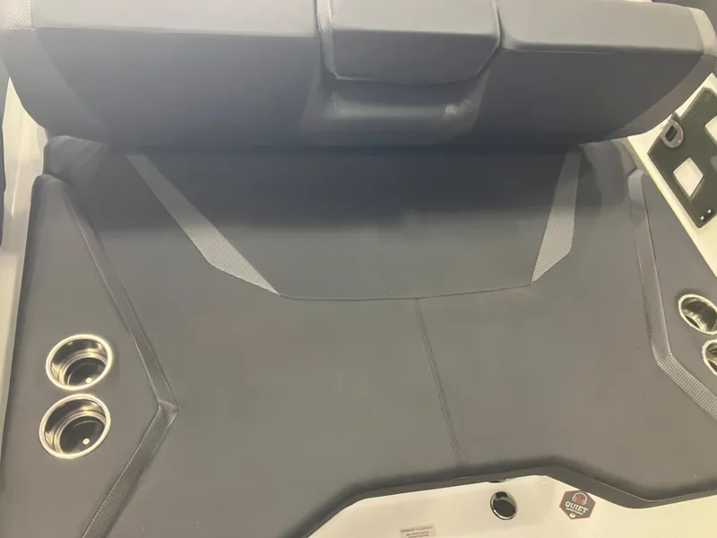 Slide: The Image of 2024 Scarab 285 boat interior seating with cup holders. - 18