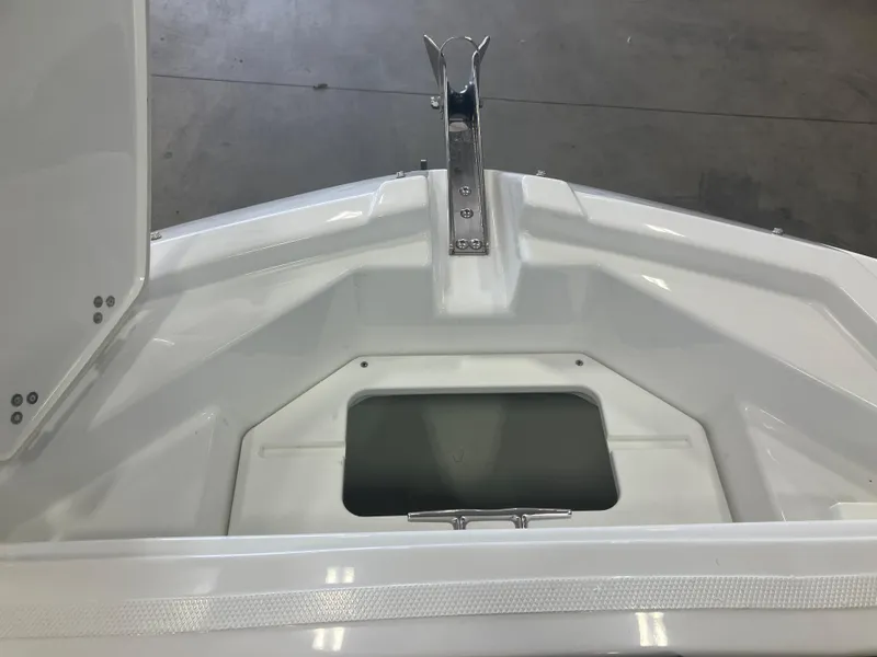 Slide: The Image of 2024 Scarab 285 boat interior with black seating and glass partition. - 17