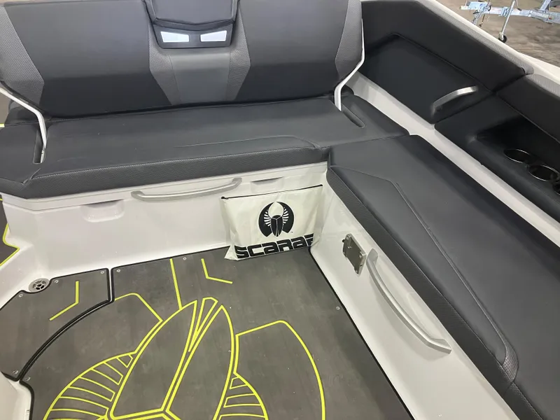 Slide: The Image of 2024 Scarab 285 boat interior with modern seating and sleek design. - 5