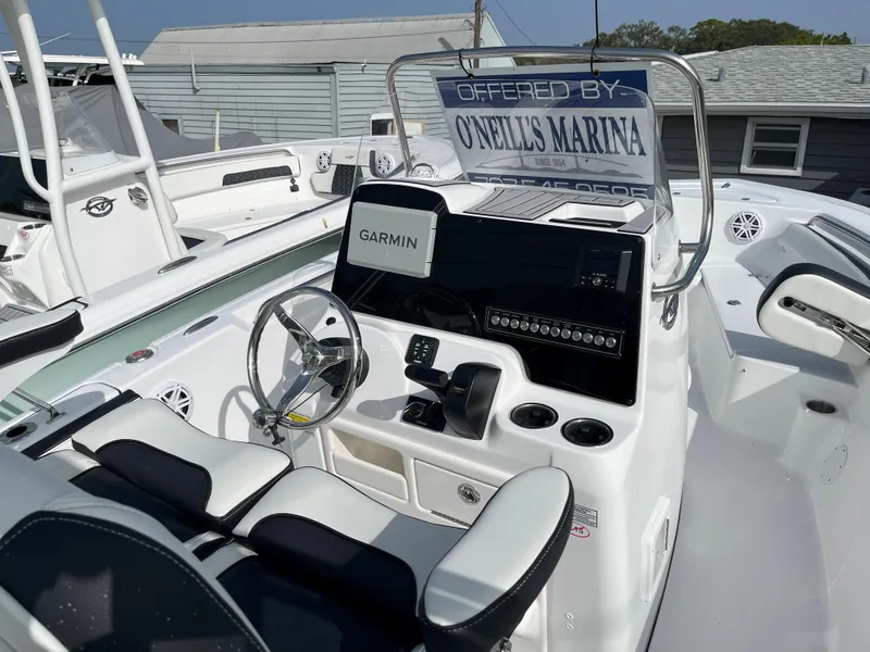 Slide: The Image of 2024 Tidewater 198 CC boat at O'Neill's Marina, featuring Garmin electronics. - 11