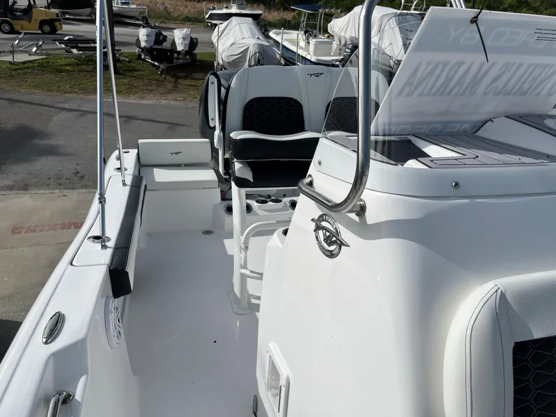 Slide: The Image of 2024 Tidewater 198 CC boat interior with seating and console. - 12