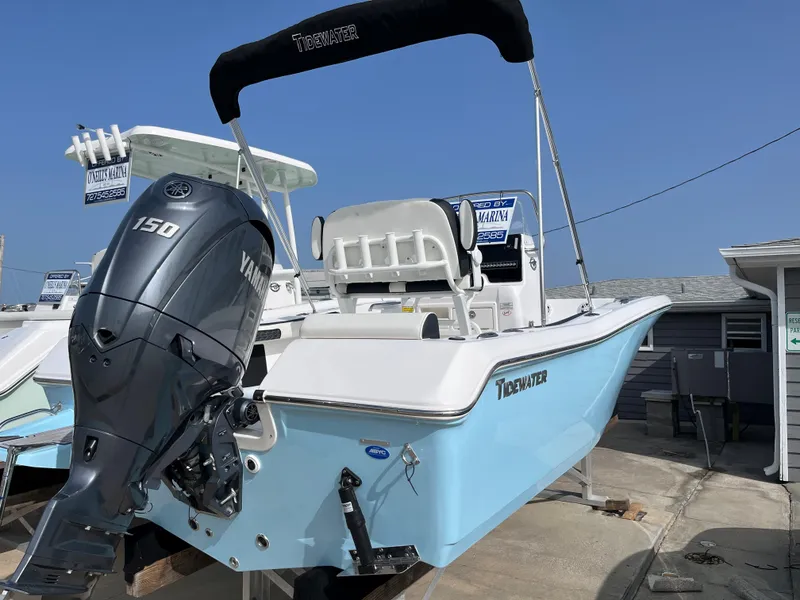 Slide: The Image of 2024 Tidewater 198 CC boat with Yamaha 150 engine, displayed outdoors. - 3
