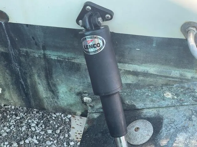 Slide: The Image of Lenco trim tab actuator on a 2003 Wellcraft 270 Coastal O/B boat. - 8