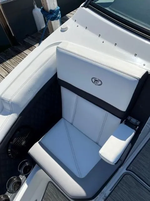Slide: The Image of 2021 Cobalt R6 boat seat with white and black upholstery. - 8
