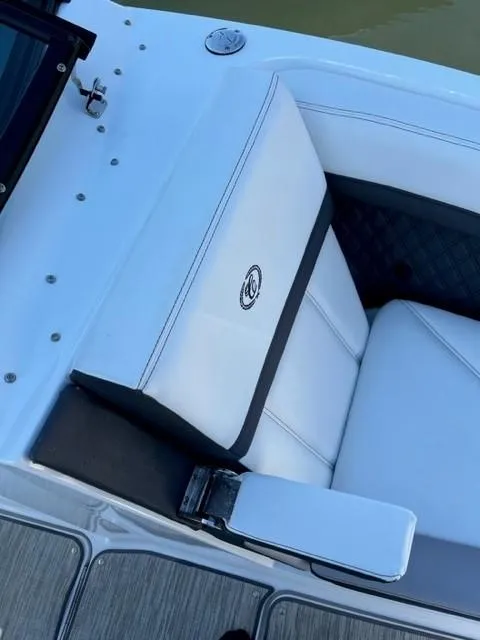 Slide: The Image of 2021 Cobalt R6 boat with white cushioned seating. - 9