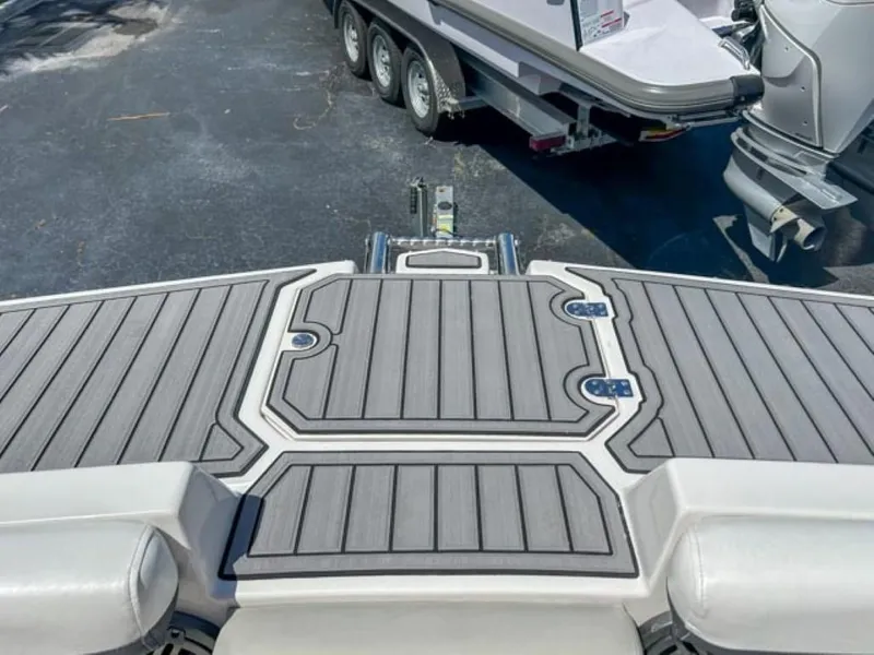 Slide: The Image of 2024 Starcraft SVX 231 OB DH boat deck with gray and white detailing. - 1