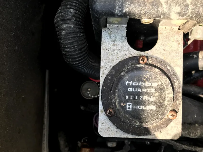 Slide: The Image of Hour meter on a 2002 Four Winns 245 Sundowner boat engine. - 11