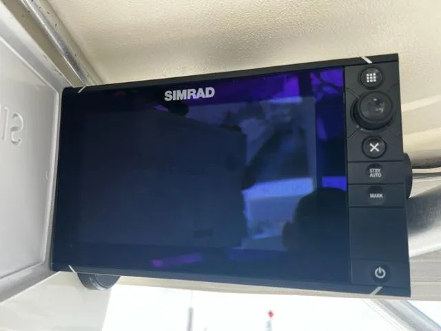 Slide: The Image of Simrad marine display on a 2003 Carolina Classic 28 boat. - 15