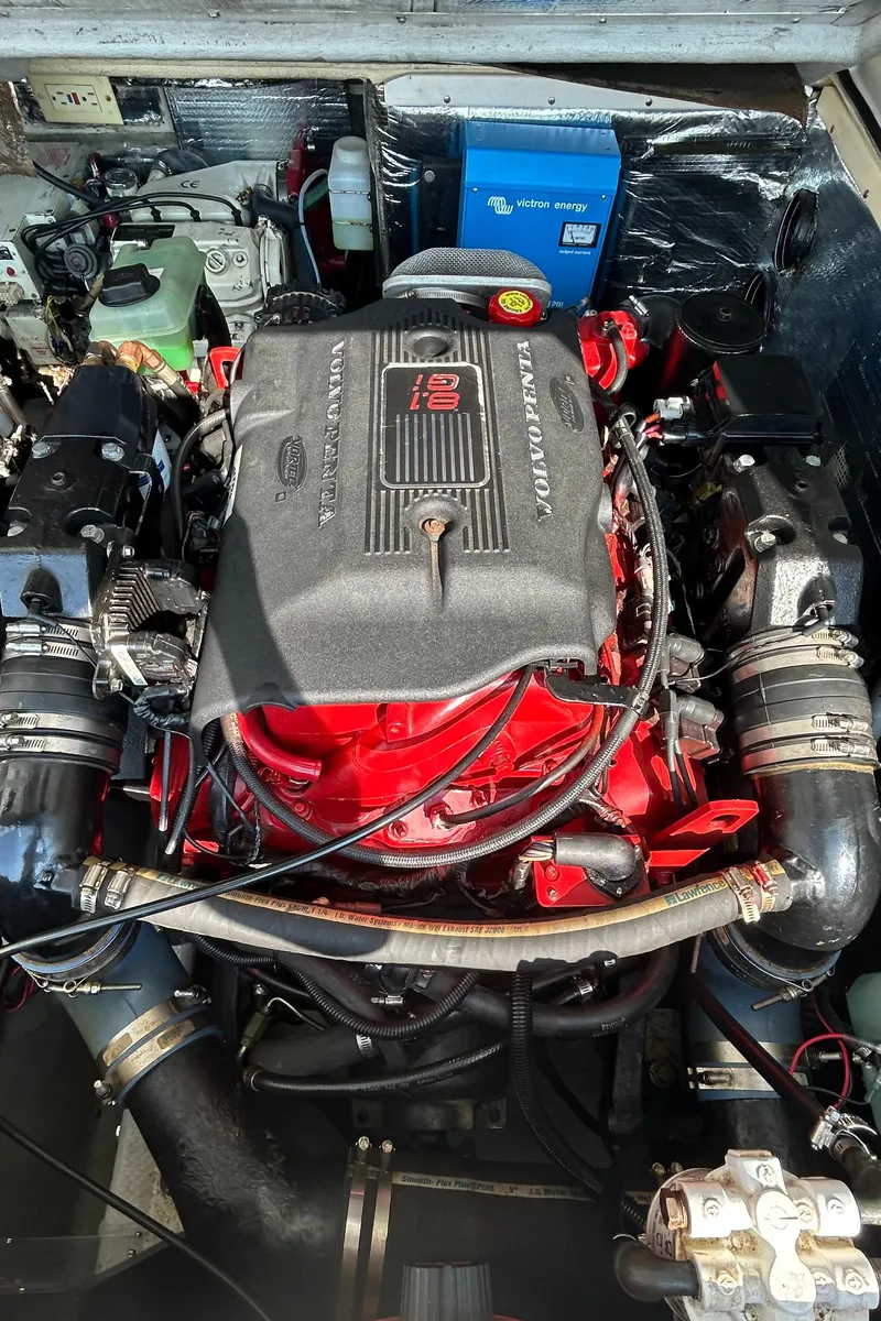 Slide: The Image of 2003 Carolina Classic 28 engine, featuring a powerful red and black design. - 33