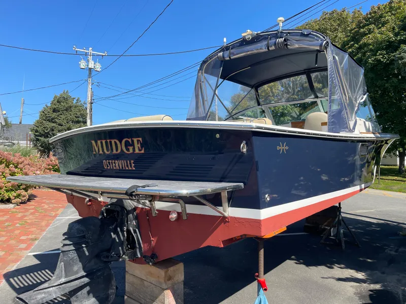 Slide: The Image of 2005 Hunt Yachts Harrier 25 boat on land, named Mudge from Osterville. - 2