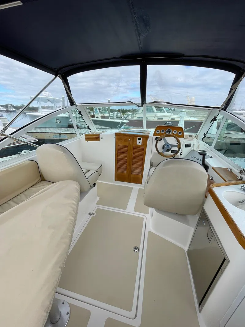 Slide: The Image of 2005 Hunt Yachts Harrier 25 cockpit with seating and helm station. - 4