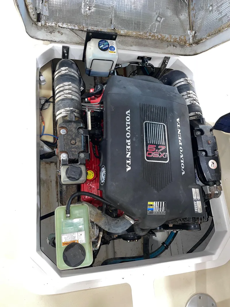 Slide: The Image of 2005 Hunt Yachts Harrier 25 engine compartment with Volvo Penta engine. - 8