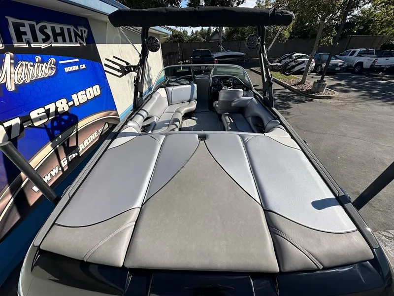 Slide: The Image of 2024 Sanger V215 SX boat with sleek interior design and comfortable seating. - 10