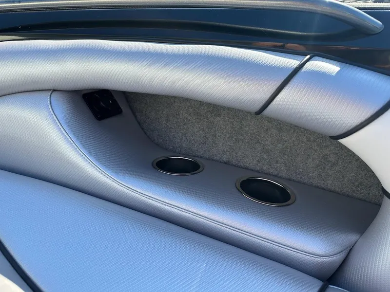 Slide: The Image of Interior seating and cup holders of 2024 Sanger V215 SX boat. - 26