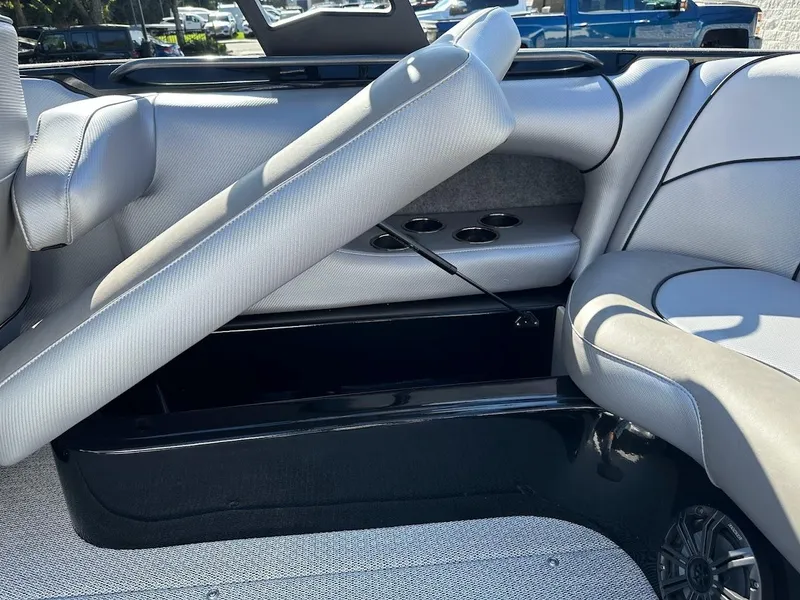 Slide: The Image of Interior seating and storage of 2024 Sanger V215 SX boat. - 30