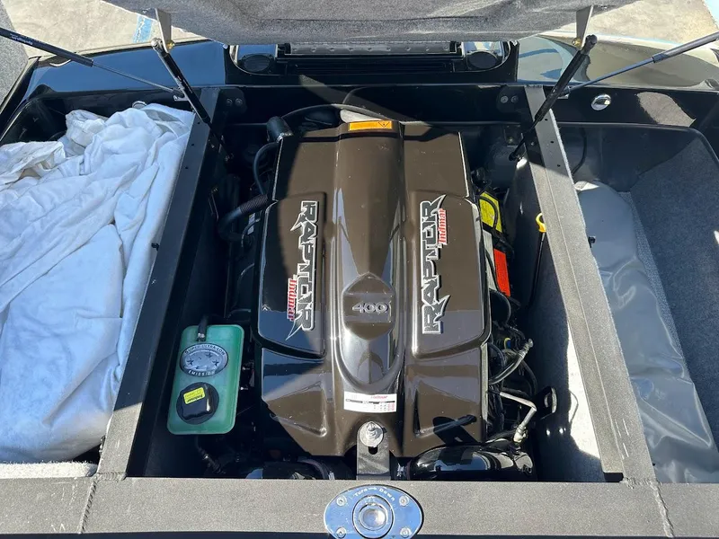 Slide: The Image of 2024 Sanger V215 SX boat engine compartment with Raptor 400 engine. - 33
