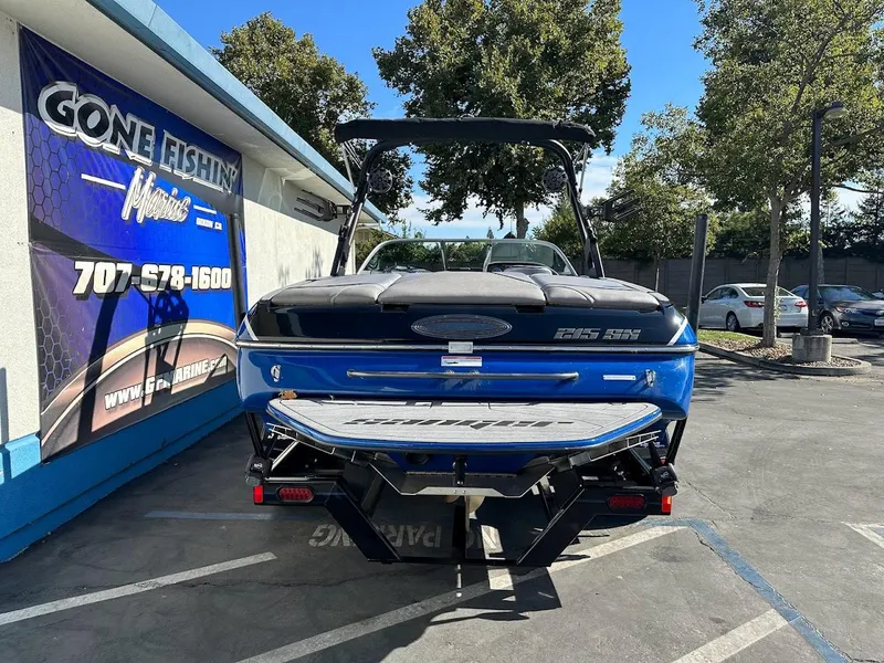 Slide: The Image of 2024 Sanger V215 SX boat displayed at Gone Fishing Marine dealership. - 6