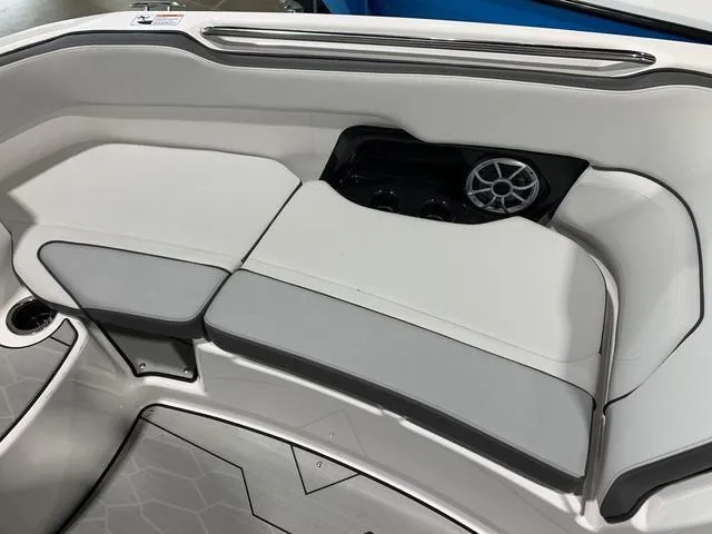 Slide: The Image of Open storage compartment on a 2023 Yamaha Boats 252XE. - 22