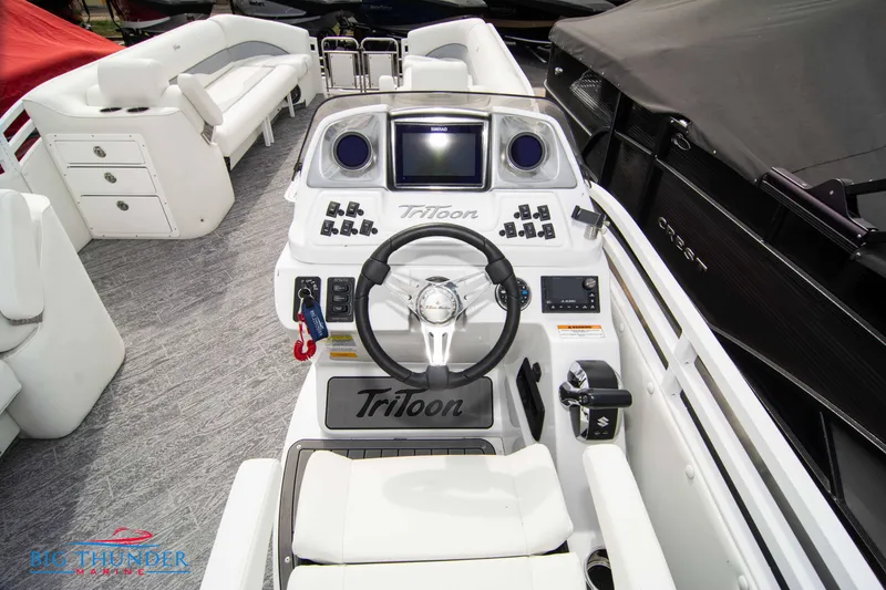 Slide: The Image of 2023 JC NEPTOON 27 TT SPORT boat interior with steering console and seating. - 20