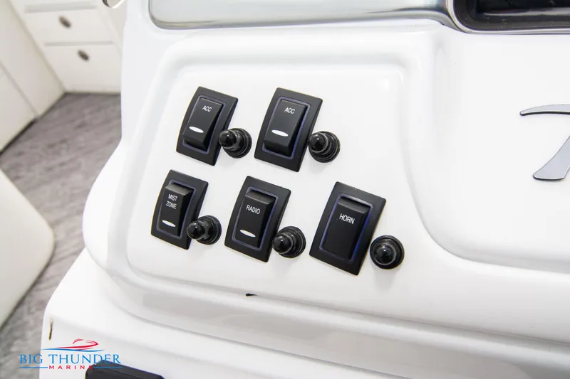 Slide: The Image of Control panel of 2023 JC NEPTOON 27 TT SPORT boat with labeled switches. - 25