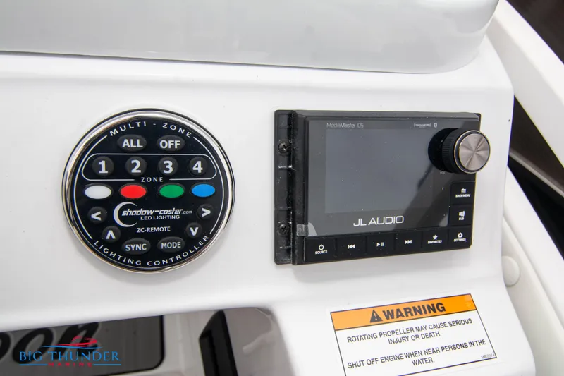 Slide: The Image of Control panel of 2023 JC NEPTOON 27 TT SPORT boat with JL Audio system. - 28