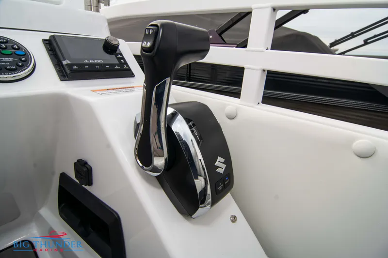 Slide: The Image of 2023 JC NEPTOON 27 TT SPORT boat throttle control and dashboard. - 30
