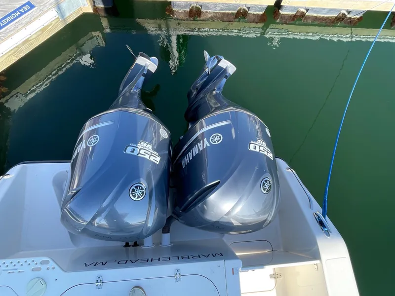 Slide: The Image of 2011 Pursuit 280 Center Console with twin Yamaha 250 outboard engines. - 10