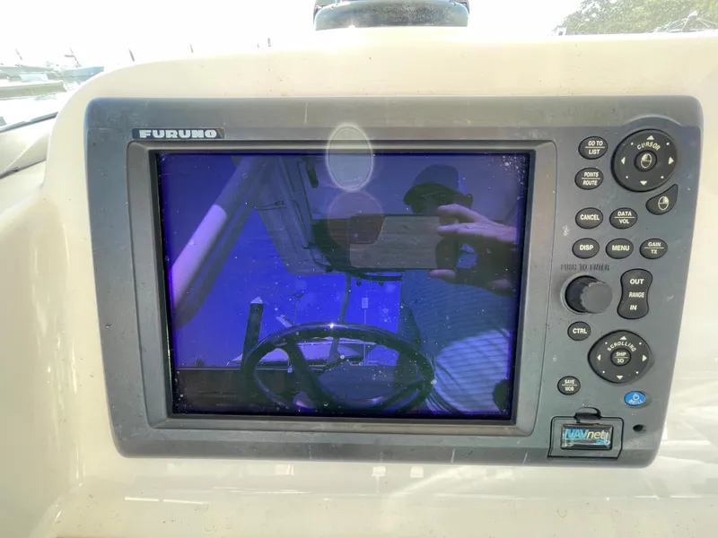 Slide: The Image of Furuno marine electronics display on a 2011 Pursuit 280 Center Console boat. - 25