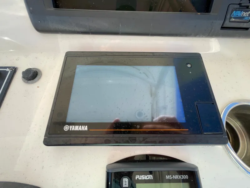 Slide: The Image of Yamaha display screen on 2011 Pursuit 280 Center Console boat dashboard. - 26