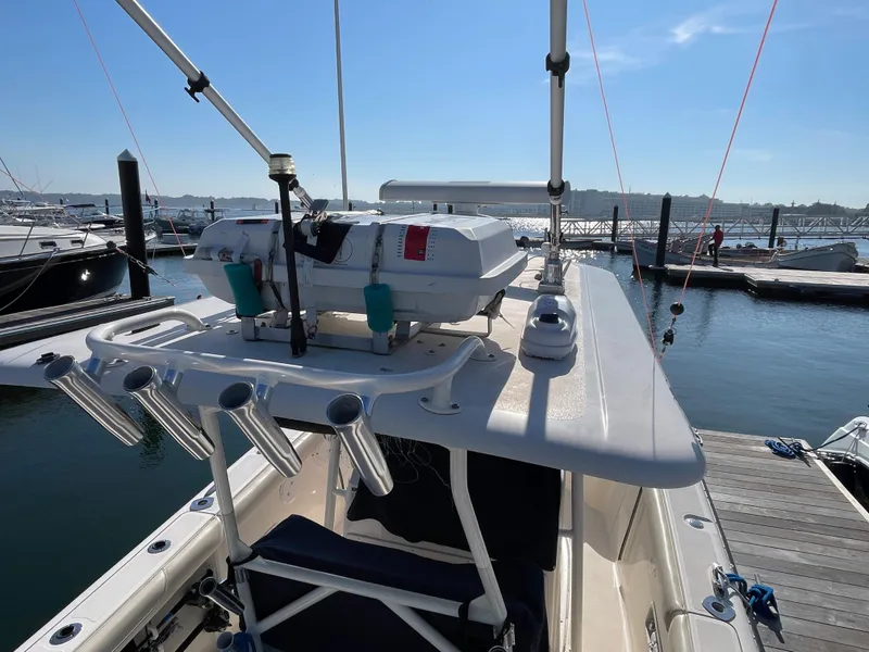 Slide: The Image of 2011 Pursuit 280 Center Console boat docked at marina. - 35