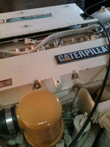 Slide: The Image of Caterpillar engine in a 2000 Cruisers Yachts 4450 Express Motoryacht. - 31